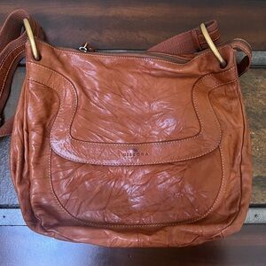 Dissona brown leather bag